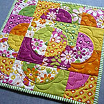 Drunkard's Path quilt using the nested Small Daisy templates to help highlight the circles -Quilt by Patti Anderson